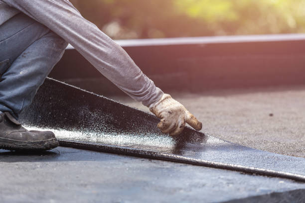 Professional Basement Waterproofing technician working in Toughkenamon, PA
